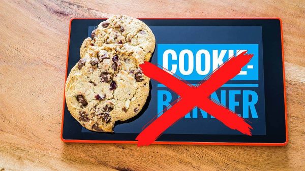 A tablet displays the words COOKIE BANNER, partially obscured by biscuits, with a red X mark superimposed on top.