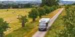 Perspective shot of a motorhome driving through the countryside