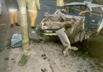 The front of the completely wrecked car in June 1989 that Clive, Jess and their friends were in and the lampost that was hit