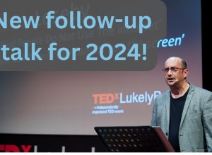 Clive giving his TEDx Talk in 2022. He is standing in front of a lectern. Text reads “New follow-up talk for 2024!” 