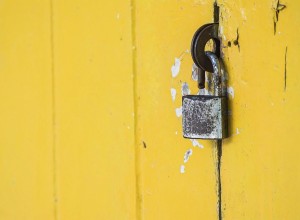 rusty padlock on vintage yellow door