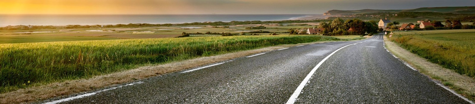 Sunset landscape with country road