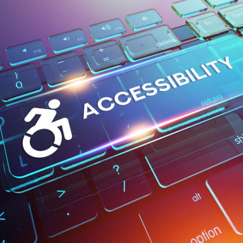 A computer keyboard with a glowing \ACCESSIBILITY\ key. The key features an accessibility icon of a person in a wheelchair. The background is a blend of blue, purple, and pink hues, creating a modern and vibrant look.