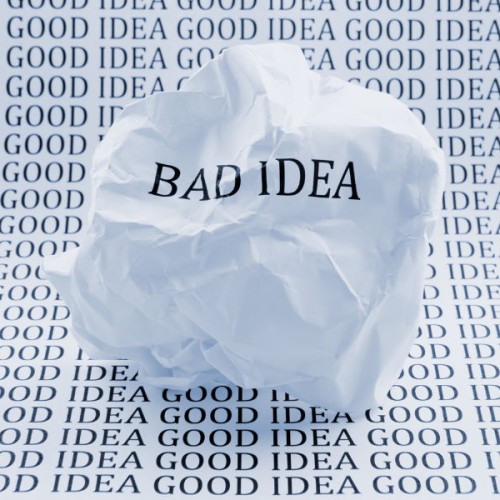 Bad Idea printed on screwed up paper, on top paper with the words Good Idea printed many times