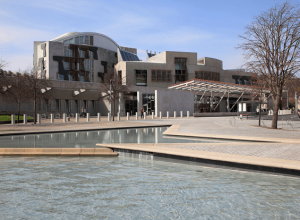 The Scottish Parliament, a modern building with water features in front of it