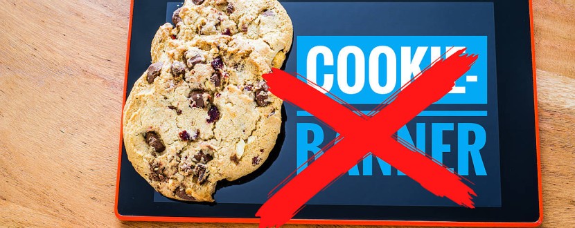 Two cookies, next to the words cookie banner with a big red cross over it