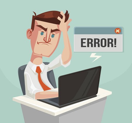 A man at his computer struggling with coding errors on his website. If you want an error-free website, call us today! 01243 776399