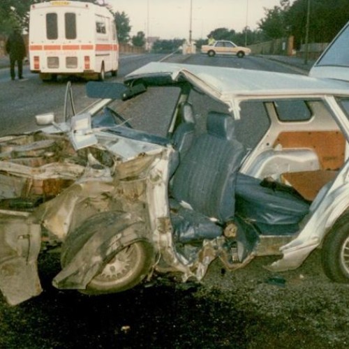 An estate car that has been very badly damaged in an accident