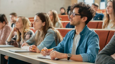 Attentive students in a lecture theatre