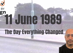 11 June 1989. The Day Everything Changed. Access by Design Logo. Clive Loseby, has no hair, glasses and is wearing a serious expression.