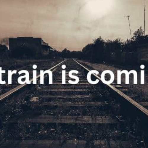 A sepia photo of a set of railway tracks. The words A train is coming is displayed over the front of it.