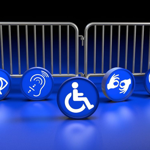 Blue icons representing different types of disabilities placed in front of metal barriers to illustrate the hidden obstacles people face online